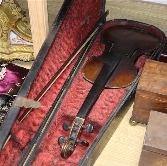 A late 19th century German violin, bears Stradivarius label, cased with bow, back 36cm